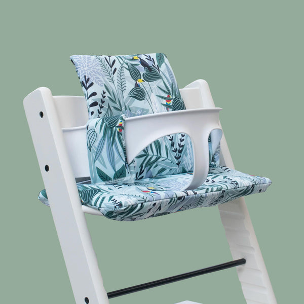 Coussin de chaise haute Tripp Trapp imperméable Lou à motifs et fond vert