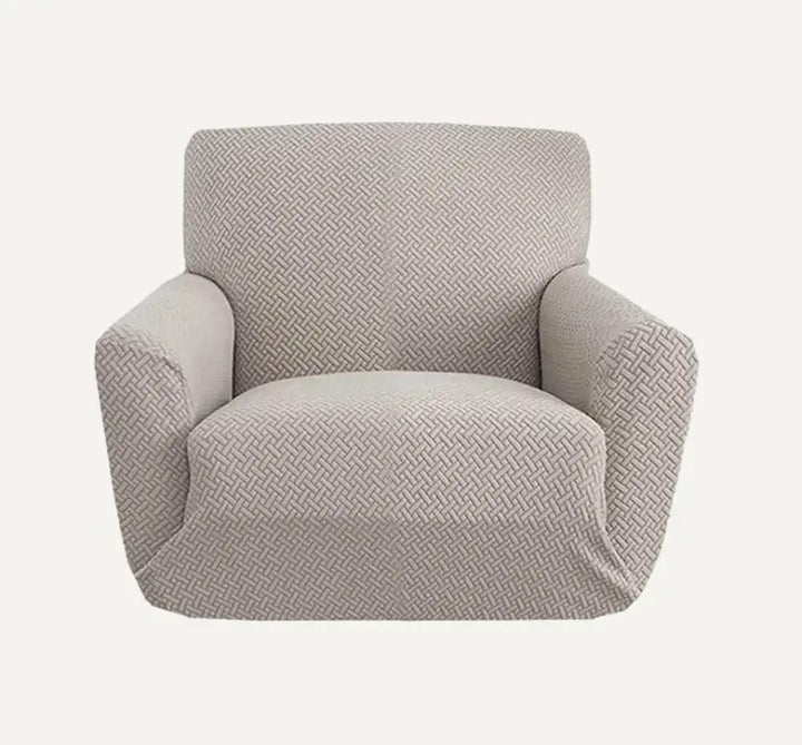 Housse de fauteuil en jacquard de couleur taupe sur fond beige