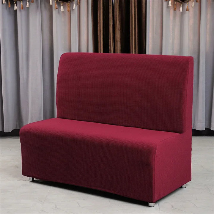 Housse de banquette en 2 parties en jacquard effet tressé Emilianna de couleur bordeaux