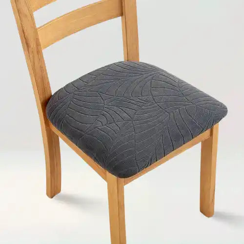Housse de siège de chaise en jacquard effet floral imperméable Cristina de couleur noir sur fond beige