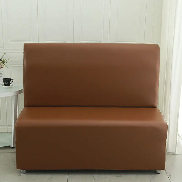 Housse de banquette effet cuir Emilianna de couleur camel