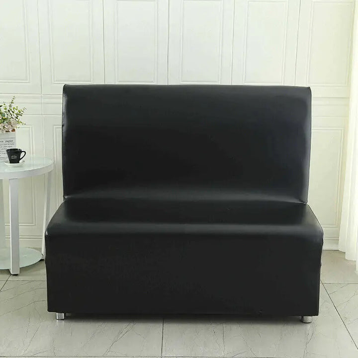 Housse de banquette effet cuir Emilianna de couleur noir