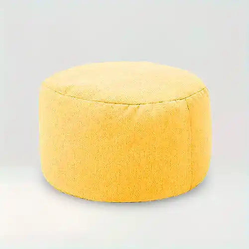 Housse de pouf rond en tissu Assia de couleur jaune sur fond beige