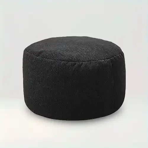 Housse de pouf rond en tissu Assia de couleur noir sur fond beige