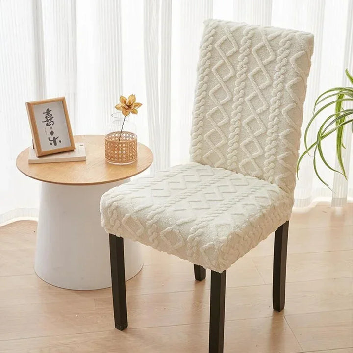 Housse de chaise en tissu épais Cassy de couleur beige vue latérale