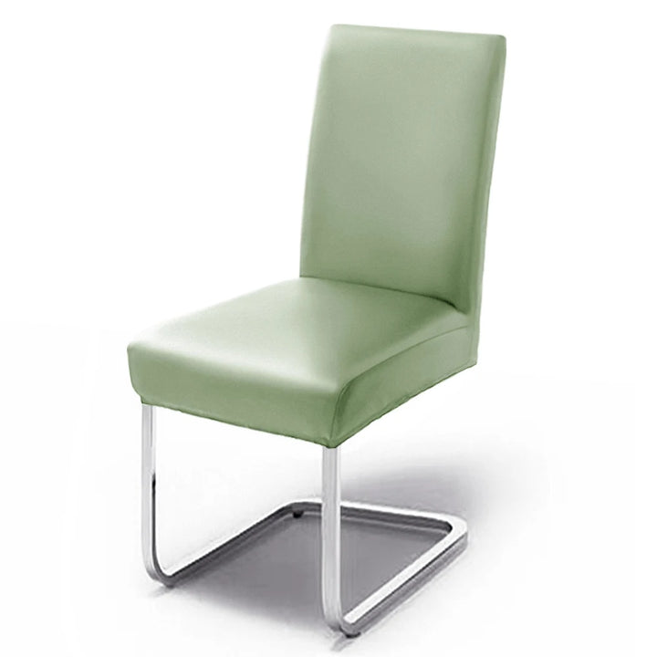 Housse de chaise effet cuir Nicole de couleur vert clair