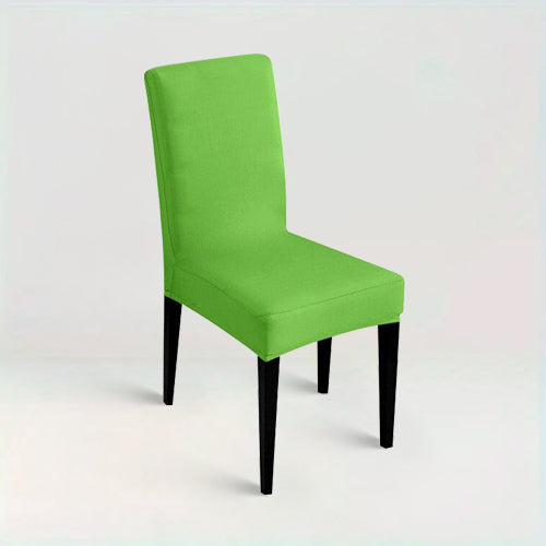 Housse de chaise Lola de couleur vert pomme sur fond beige