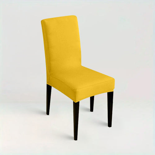 Housse de chaise Lola de couleur jaune sur fond beige