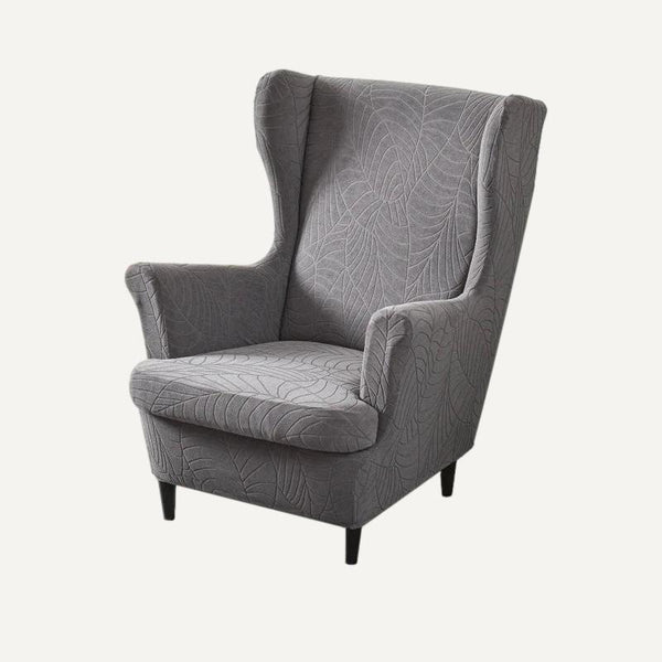 Housse de fauteuil à oreilles en jacquard effet floral Laurena de couleur gris foncé sur fond beige