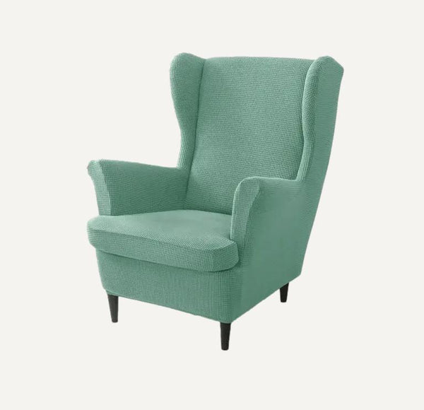 Housse de fauteuil à oreilles en jacquard Iris de couleur vert clair sur fond beige