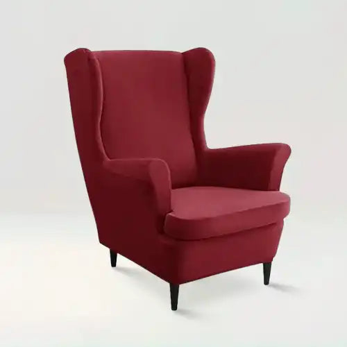 Housse de fauteuil à oreilles en velours Zina de couleur bordeaux sur fond beige