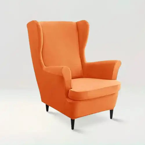 Housse de fauteuil à oreilles en velours Zina de couleur orange sur fond beige