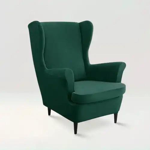 Housse de fauteuil à oreilles en velours Zina de couleur vert sur fond beige