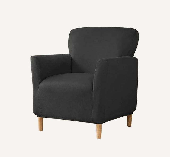 Housse de fauteuil club en velours Andrea de couleur noir sur fond beige